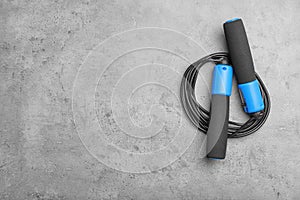 Jump rope and space for text on grey background
