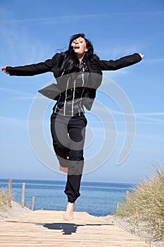 Jump woman photo
