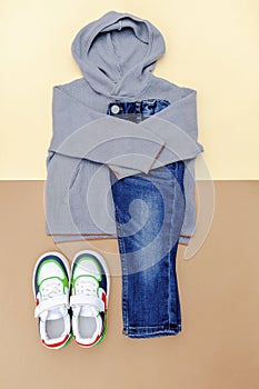 Jumper and jeans pants with sneakers. Set of baby children's clothes and accessories for spring, autumn or summer
