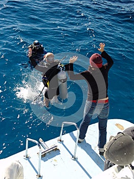 Jumping into the blue water