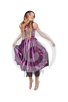 Jumping girl in violet dress