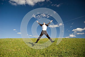 Jumping happy businessman