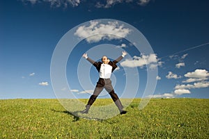 Jumping happy businessman