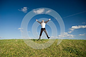 Jumping happy businessman