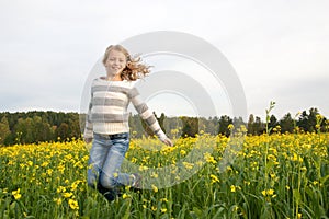 Jumping happy girl outdoor