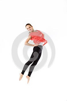 Jumping happy young woman, isolated on white