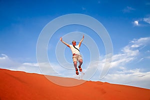 Jumping high on the sand dunes