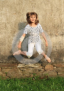 Jumping little girl