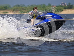 Jumping man on jet ski