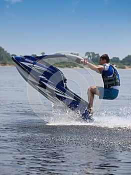 Jumping man on jet ski
