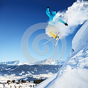 Jumping Skier in high mountains