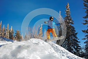 Jumping snowboarder