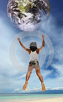 Jumping to the planet on beach