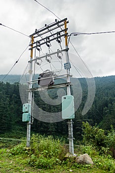 June 16th 2021 Uttarakhand India. Electricity poles with overhead transformers in remote areas with mountains and forest in the
