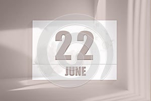 june 22. 22th day of the month, calendar date.White sheet of paper with numbers on minimalistic pink background with