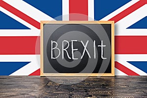 June 23: Brexit UK EU referendum concept with flag and handwriting text written in chalkboard on black