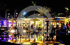 Pool Terrace from Nightclub and Bar, Friends Having Fun at Dinner, Night Party