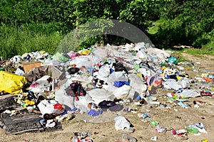 JUNE 19, 2020 Russia, Moscow: People throw away plastic bottles, bags and food waste, leave trash on the street. Concept of