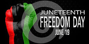 Juneteenth Freedom Day Celebration with Fist in Three color Red black and Green. photo