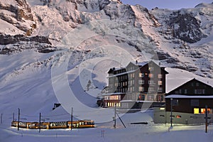 Jungfraubahn ariving in Kleine Scheidegg station. Swiss Alps