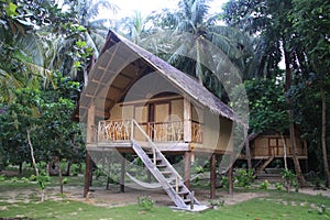 Jungle Hut on a Beach in Philippines photo