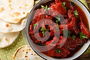 Jungli Laal Maas -A famous dish from Rajasthan - fiery hot mutton dish close-up. Horizontal top view