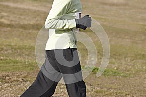 Junior athletic runner on a cross country race. Outdoor circuit