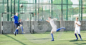 Junior football teams having scrimmage