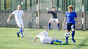 Junior football teams having scrimmage