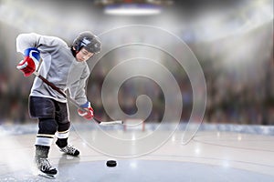 Junior Hockey Player Puck Handling in Arena