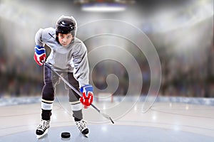 Junior Hockey Player Puck Handling in Arena