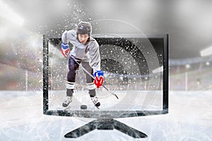 Junior Ice Hockey Player on Live 3D TV Inside Stadium