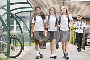 Junior school children leaving school photo