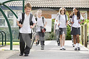 Junior school children leaving school photo