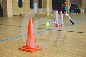 Junior teenage school team of kids children play basketball, players in the hall indoor venue court, sports team during the game,