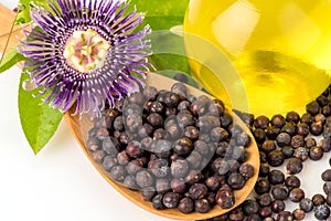 Junipers  or Juniperus ,dried fruits and oil on a white background.