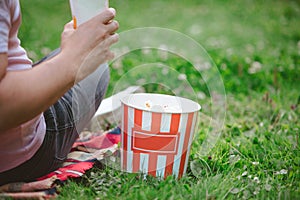 junk food popcorn soda drink ready for movie watching at open air cinema