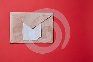 Junk mail or spam e-mail and unsolicited letter idea. Toilet paper sticking out of the envelope