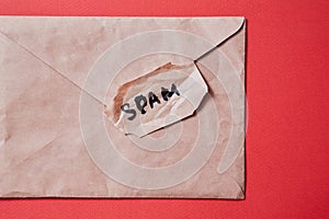 Junk mail or spam e-mail and unsolicited letter idea. The word `spam` on the envelope