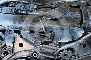 Junk metal parts and elements such as cogwheels, flanges and stell plates welded and pressed together