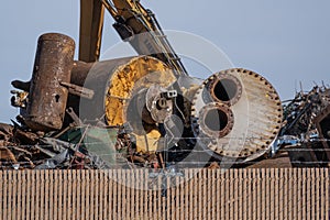 Junk yard for metal recycling with pile of scrap metal