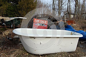 Junked bath tub