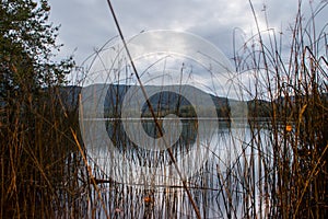 Junks with a lake and a mountain in the background