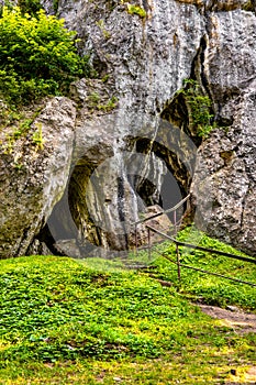 Jurassic limestone rock formations and natural caves in Gora Birow Mountain in Podzamcze of Silesia in Poland