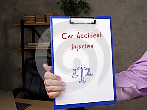 Juridical concept meaning Car Accident Injuries with phrase on the sheet