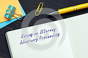 Juridical concept meaning Hiring an Attorney Adversary Proceeding with phrase on the page photo