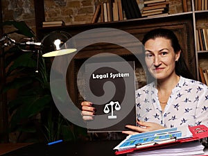 Juridical concept meaning Legal System with sign on the page