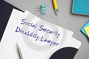 Juridical concept meaning Social Security Disability Lawyer with sign on the sheet