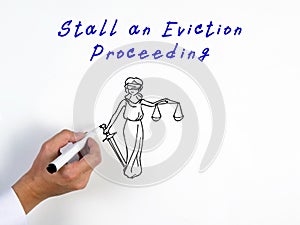 Juridical concept meaning Stall an Eviction Proceeding with sign on the sheet