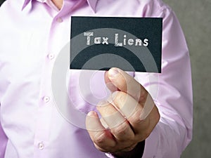 Juridical concept meaning Tax Liens  with sign on the page